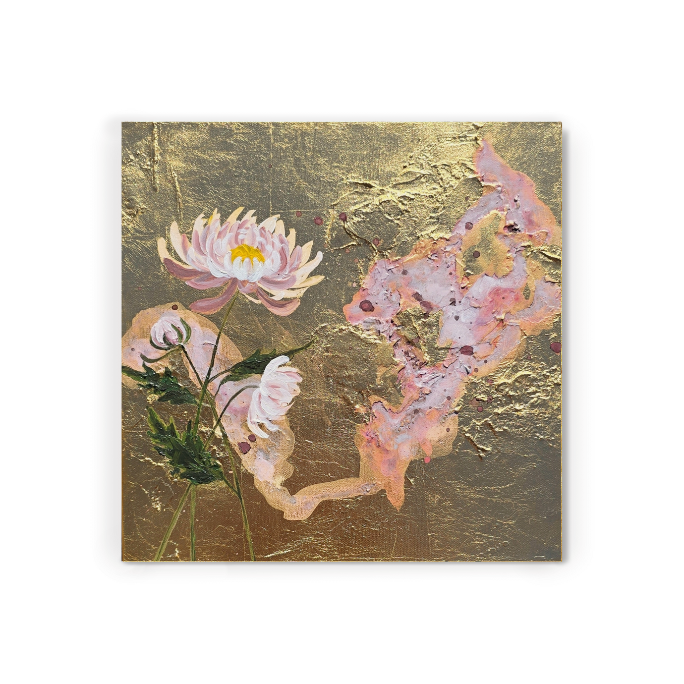 Beautiful chrysanthemum flowers on a brilliant gold foil canvas